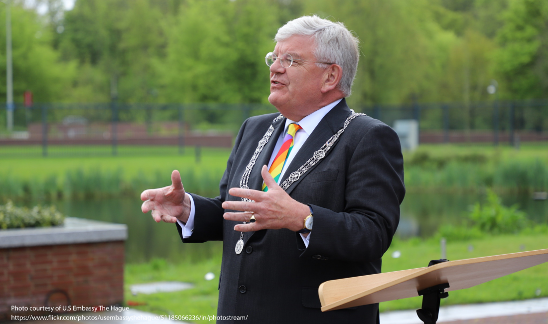 The Hague Mayor Jan van Zenen attending a rainbow flag raising ceremony at the U.S Embassy The Hague.
